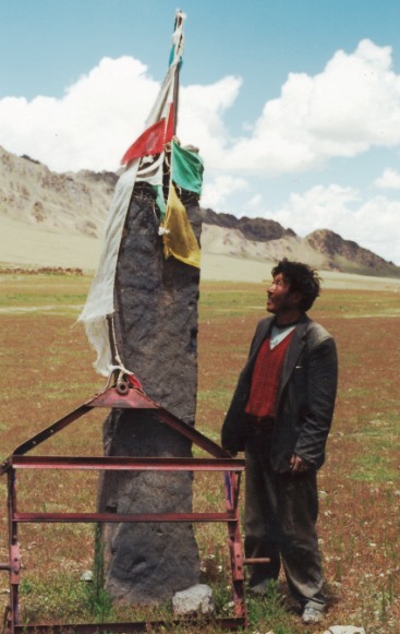 Fig. 13. At 2.4 m, this is the tallest pillar of its kind discovered in Upper Tibet. Reportedly, the enclosure and several other large well-hewn pillars were destroyed in the Chinese Cultural Revolution during a failed agricultural project.