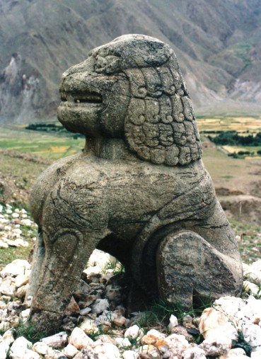 Fig. 18. This is the famous stone lion of the Chonggye (’Phyong-rgyas) royal burial grounds in southern Tibet. It is approximately 1.5 m in height and found near the burial mound of King Dusong Mangpoje (’Dus-srong mang-po rje), who lived between circa 676 and 704 CE. This lion sculpture must have been installed at the tomb as a guardian and royal status symbol. Protective gods of the dead in the shape of lions are noted in archaic funerary rituals of the Bon religion.