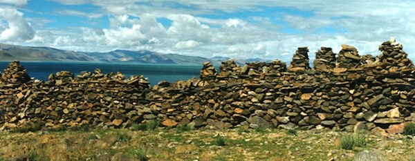 Fig. 17. Among the many ruined shrines of the big black headland is one consisting of a meandering masonry base 34 m in length surmounted by a series of pyramidal structures. 