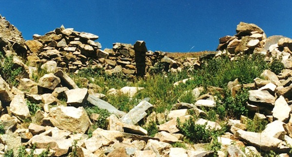 Fig. 19. Another ruined dokhang of the Red House site. Note the lone corbel suspended over the rear wall.