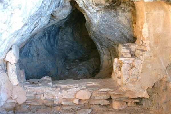 Fig. 5. The walled off rear chamber of a cave. As this wall is sheltered inside a cave, much of the plaster covering it is still intact. 