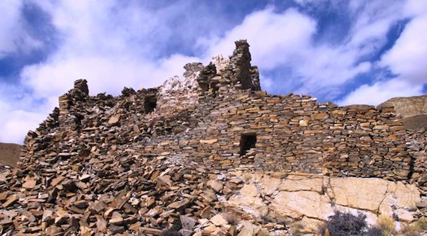Fig. 5. The building with the tallest walls in Sector IV of the citadel, situated on the highest portion of the summit. Like other buildings at the site, the random-rubble slab walls were very adeptly built. In the forward portion of this two-story structure is an opening (approximately 1.2 m in height) with a stone lintel. This may have been the egress of a latrine pit. 