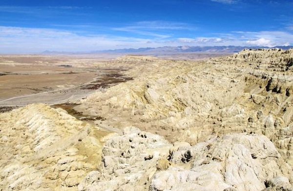 Fig. 10. Looking north from the central spur. The western spur can be seen in the foreground. In the distance is the Transhimalayan A-yi-la Range.