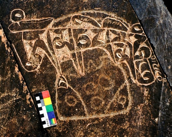 Fig. 11. A so-called mascoid, a relatively rare and historically valuable subject found in various configurations throughout Inner Asia. It was damaged by a deeply incised mani inscription, the carver adding it on religious grounds for good measure. This muffin-shaped mascoid is ornamented with circles in its lower half but the design of the upper half is no longer discernable. The mascoid may be of the late Bronze Age or Iron Age, northwestern Tibet.