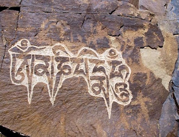 Fig. 5. The mani mantra carved over a complex scene consisting of horsemen, wild ungulates and other figures, western Changthang.