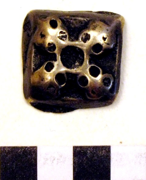 Fig. 3. A similarly designed object of the Tibetan amulet group known as thokcha (thog-lcags), 2.5 cm in width. Private collection, photograph by author. 