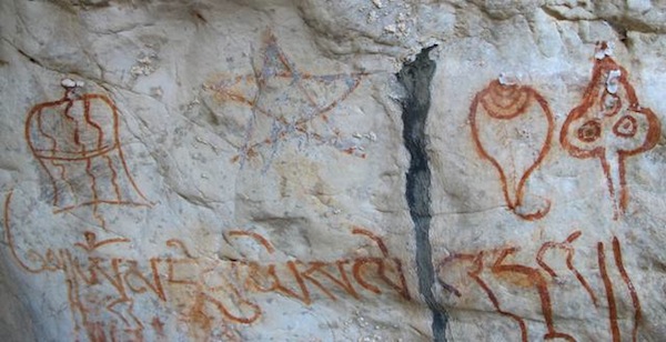 Fig. 10. The eight-syllable mantra Om’ ma tri mu ye sa le ’du’ of the Bon religion and four auspicious symbols in a row, consisting of victory banner, five-pointed star, conch, and triple gems (this inscription and symbols were briefly discussed in last month’s newsletter). The pigment and wear characteristics of the inscription and symbols indicate that they were executed in the same general timeframe. The presence of the octosyllabic mantra, which does not occur in Old Tibetan texts, suggests that these ochre applications postdate 950 or 1000 CE.