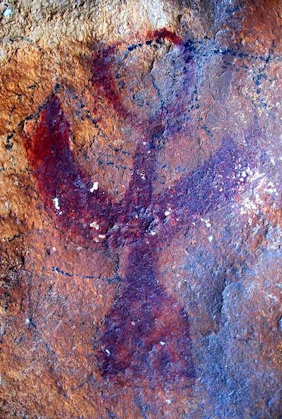 Fig. 2. A red ochre raptor with prominent horns found at a newly documented rock art site, eastern Changthang.  This pictograph (20 cm in height) has undergone much wear and geochemical change necessitating rigorous digital enhancement in order to fully appreciate its beauty.