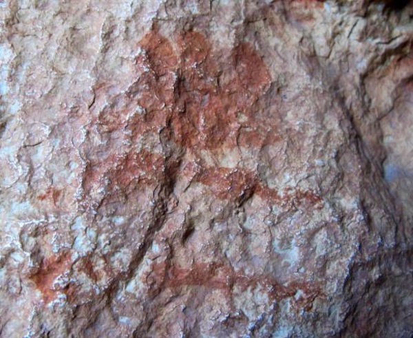 Fig. 11. A close-up of the upper specimen in Figure 10. The prominent tricuspidate finial rests upon a base consisting of two or three tiers. Much of the pigmentation of this pictograph (5 cm in height) has been ablated and has browned as well. The style of the depicted object and its physical condition are indicative of considerable age. It dates either to the protohistoric period (100 BCE to 600 CE) or to the early historic period.