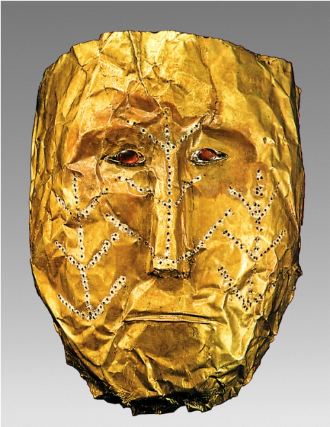 Fig. A. Golden funeral mask of a woman with tattoo-like decorations which represent the trees of life. These decorations were created by puncturing on the reverse and covering with white paint on the obverse. Rouran period, 5th–6th century CE. Excavated in 1958 in Shamsi, Chui Province, Kyrgyzstan. Caption and photo courtesy of Dr. Christoph Baumer. Photo credit: National Historical Museum of Kyrgyzstan, Bishkek.