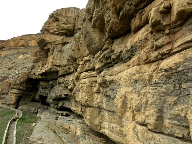 Fig. 10. The cliff at Tashigang that has signs of ancient habitation.