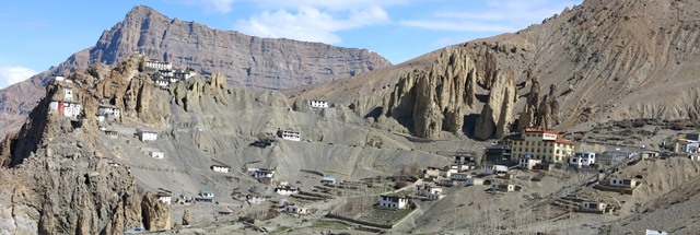 Fig. 17. The modern monastery at Dankhar (large yellow building on the right side of the photograph) and the old monastery in the crags (left side of the image).