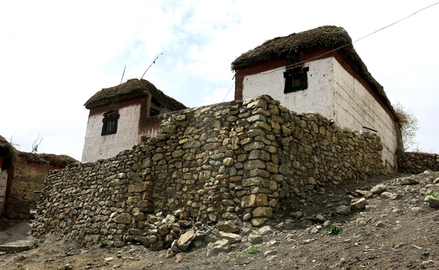 Fig. 17. The south and east sides of the Tenzin Tsultrim residence, Key village. The high walls in front of the house enclose a courtyard where sundry domestic functions take place.