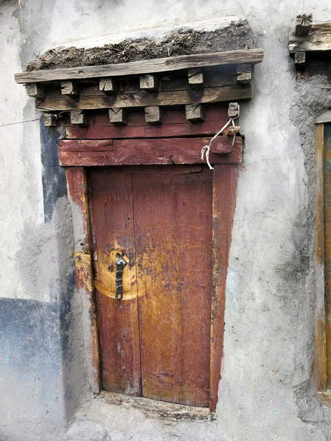 Fig. 23. The doorway to the family chapel, Tenzin Tsultrim house.