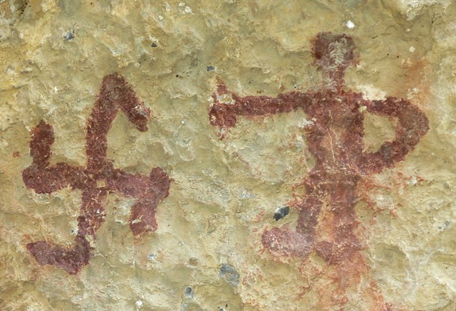 Fig. 14. Anthropomorph and swastika, Nyima Loksa Phuk. Protohistoric period.