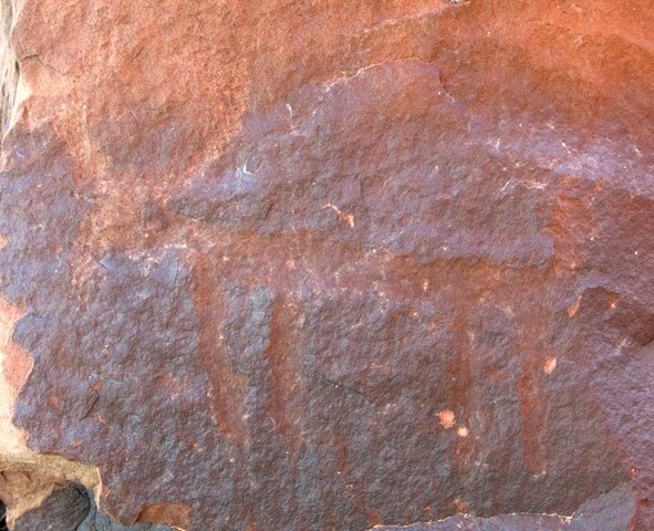 Fig. 38. Portrait of what appears to be a wild yak (20 cm long), Lari Tingjuk (La-ri ting-mjug; el. 3255 m). Although this petroglyph is not much more than a stick figure, its horns, head and tail are very much yak-like. Protohistoric period.