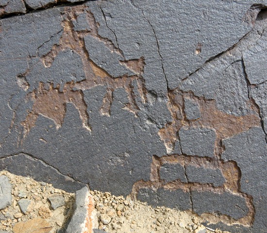 Fig. 49. A two-stepped shrine with hemispherical top portion (8 cm high) and horseman deeply carved into the rock, Poh Thangka. Probably Protohistoric period.