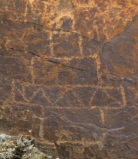 Fig. 63. Shrine or chorten with four tiers and small bumpa (38 cm high), Gyurmo (el. 3360 m). Note the band of triangles in the overlapping level. Protohistoric or Early Historic Period.