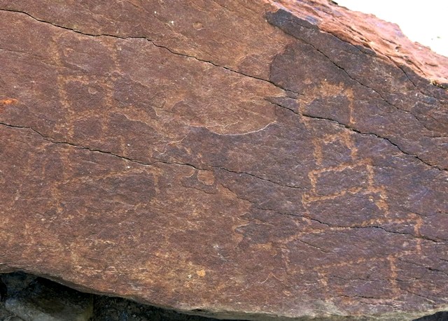 Fig. 64. Two shrines or chortens (20 cm and 23 cm high) in style similar to specimen in fig. 63, situated on the same southwest face of the boulder, Gyurmo. Early Historic Period.