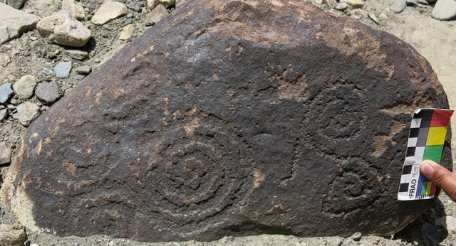 Fig. 75. Two scrolls on small boulder, Gyari. Iron Age.