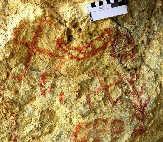 Fig. 86. Red ochre composition of crescent moon and swastika, Sinmo Khadang. In close proximity are other pictographs, including a swastika, tree and circles. Protohistoric period.