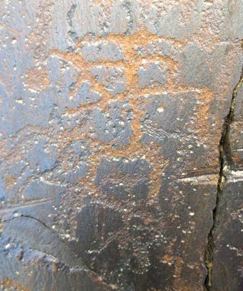 Fig. 6.7. What appear to be anthropomorphs and animals forming an interconnected melody of figures on the same big rock panel as above. Iron Age and Protohistoric period
