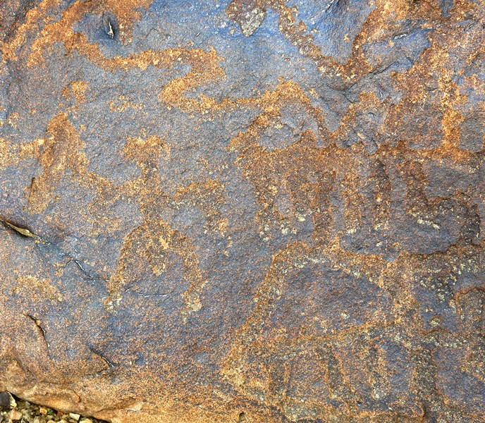 Fig. 10.7. Close-up of the anthropomorph and surrounding figures on the lower left side of the boulder in fig. 10.6.