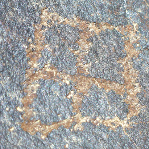 Fig. 14.55. A square divided into four quarters (6 cm high). Protohistoric period.