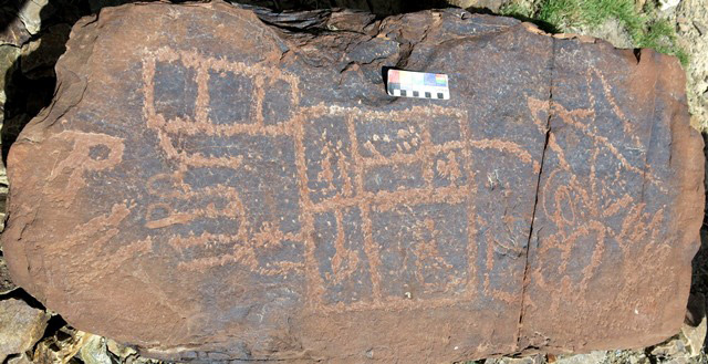 Fig. 14.59. Hourglass-shaped subject (top right), flaming jewel-like subject (bottom right), complex rectilinear design comprised of joined squares some of which have internal elements (middle) and letter-like designs (left side). Part of the figure that resembles the letter R was carved at a later date. Early Historic or Vestigial period. The letters PO were carved over the right side of the complex rectilinear subject.