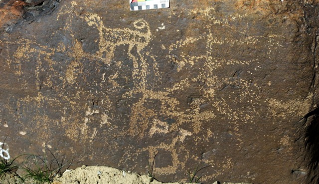 Fig. 18.21. Anthropomorph and feline (upper left), tree (upper right) and other figures. Probably Vestigial period or later. Note the recently carved letters: P T.