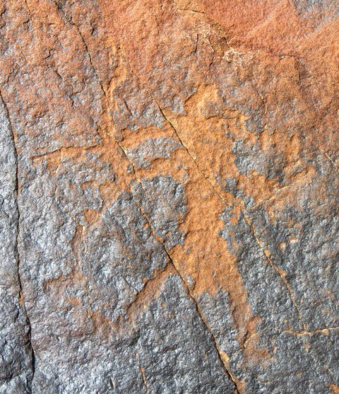 Fig. 20.17. Standing archer (11 cm high). This boulder has been broken and the quarry of the hunter is no longer extant. There is also recent graffiti on the boulder. Early Historic period.