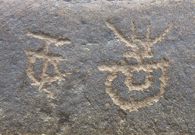 Fig.3. These two carvings are found on the opposite side of the boulder pictured in fig. 2.