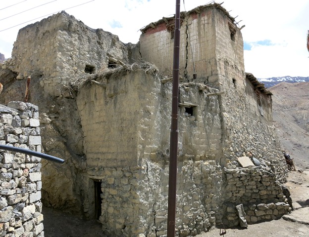 Fig. 9. A former residence of stone and mud brick at Khartö now used for storage. Notice the tiny entranceway. This is one of the oldest intact houses left in Spiti. It should be earmarked for preservation.