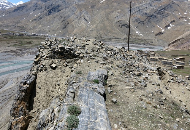Fig. 13. The traces of structures on the summit of Kharteng looking north. The sheer drop on the southwest side of the hill is seen on the left side of the photograph.