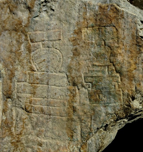 Fig. 21.12. Two spireless chorten in between the lower sections of the large central and south specimens. The larger of the twin chorten is 30 cm in height.