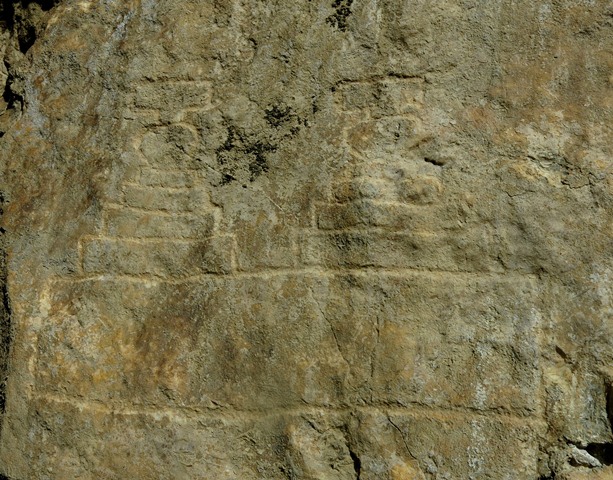 Fig. 21.13. Two spireless chorten sharing the same prominent base (20 cm in height). These are the southernmost carvings on the rock panel at Jomo Phuk.