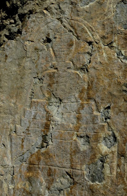 Fig. 21.9. The large south chorten, Jomo Phuk. This specimen appears to have the same type of finial as the other two large chorten but very little of it remains intact. The various stages of this monument are also filled with rows of subsidiary chorten: rounded midsection (four rows) and six tiers of base (one row in each).