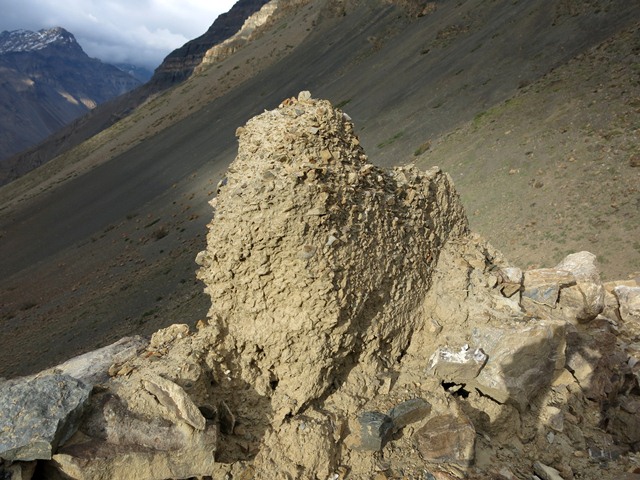 Fig. 21. A highly eroded rammed earth fragment in the outer north wall, Kharnya.