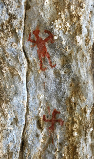 Fig. 27.3. An adjacent part of the north wall of Nyima Loksa Phuk, with anthropomorph and swastika. These two pictographs may possibly have been painted at the same time.