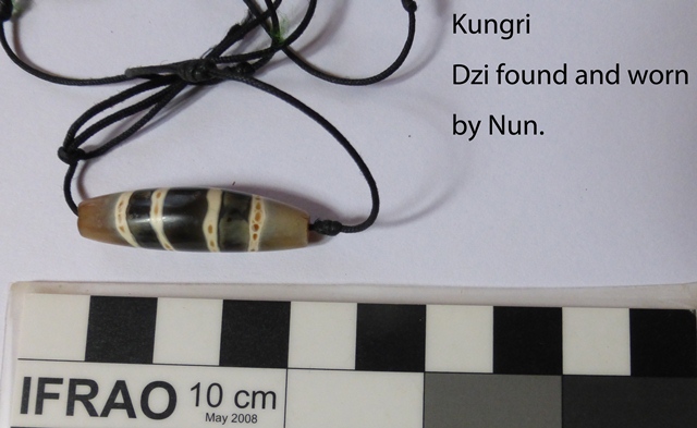 Fig. 27. Banded agate retrieved by local woman from one of the tombs of Gungri. Photo courtesy of SRAHS.