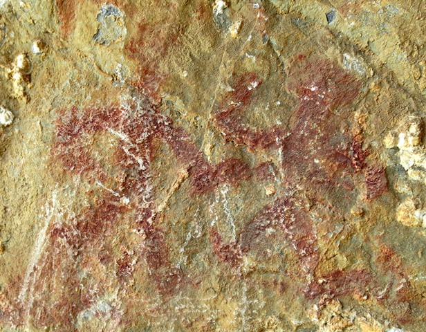 Fig. 28.9. A composition consisting of a pair of anthropomorphic figures (around 9 cm high) located in middle of the cave wall pictured in fig. 28.3. Their arms and legs swing wide, suggesting that these figures are dancing or engaged in some other kind coordinated behavior suggestive of ritualism.