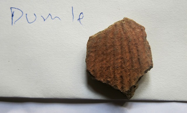 Fig. 52. A single fragment of a cord-marked redware vessel of the type deposited in tombs in Spiti. This ceramic sherd came from the settlement of Dumle.