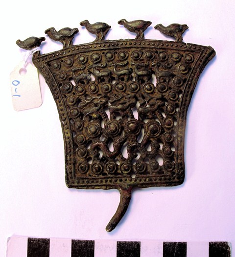 Fig. 5. Trapezoidal openwork animal style thokcha, Tibet. The animals shown in profile on this object are (from bottom to top) snakes (2 examples), stags (3), antelope / ibex (5), birds (6). Probably Iron Age. Collection of Moke Mokotoff, New York.