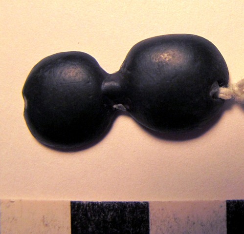Fig. 25. Thokcha talisman consisting of two joined hemispherical forms. Moke Mokotoff collection, New York.