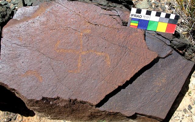 Fig. 12. Swastika and crescent moon, central Changthang. These two subjects appear to constitute a single composition. Iron Age.