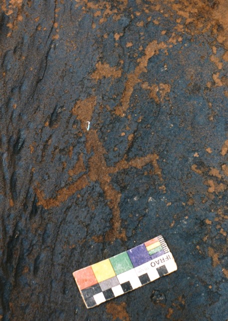 Fig. 31. Two primitive swastikas on boulder, western Changthang. Probably Iron Age, as suggested by the general contents of the site.