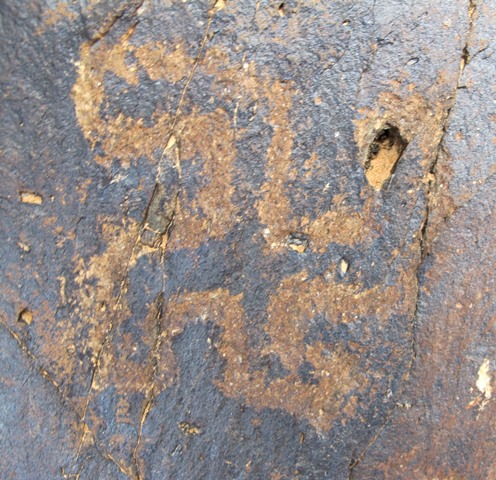 Fig. 36. This style of swastika is distinguished by carved parallel lines, central Changthang. Located at same site as fig. 35. Iron Age or Protohistoric period.