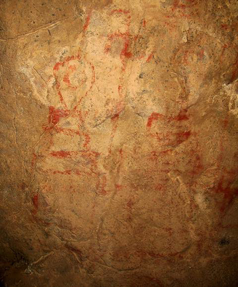 Fig. 43. Twin stepped shrines and counterclockwise swastika, central Changthang. Early Historic period. These pictographs are found in the same cave sanctuary as fig. 38.