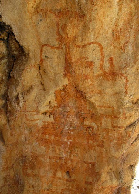 Fig. 44. Elaborate stepped shrine with counterclockwise swastikas in and around it, eastern Changthang. This Early-Historic-period example is a historical predecessor of later Yungdrung Bon variants. Of special note, is the horn-like finial with a rounded prong in the middle, which recalls the ‘horns of the bird, sword of the bird’ (bya ru bya gri) crown (tog) of Yungdrung Bon. The short inscription above the stepped shrine is not legible.