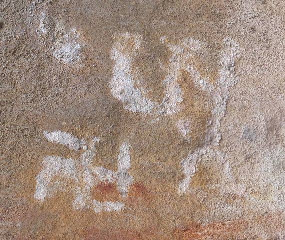 Fig. 52. Counterclockwise swastika and the syllable A’ written in a white pigment, eastern Changthang. Probably Early Historic period.